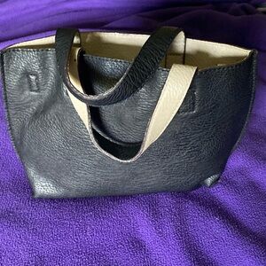 Black leather small handbag.